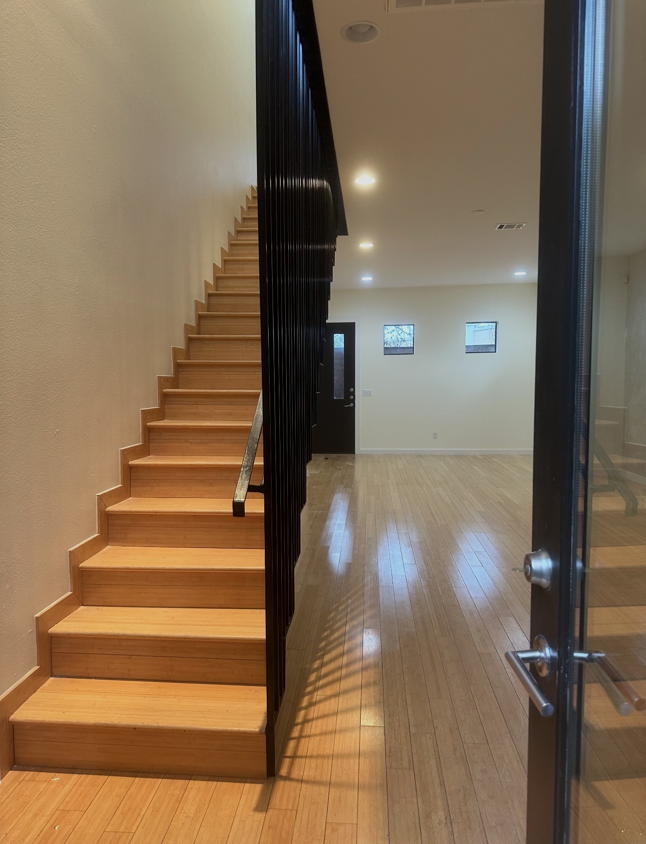 Completed Austin-area interior renovation with restored stairs and flooring